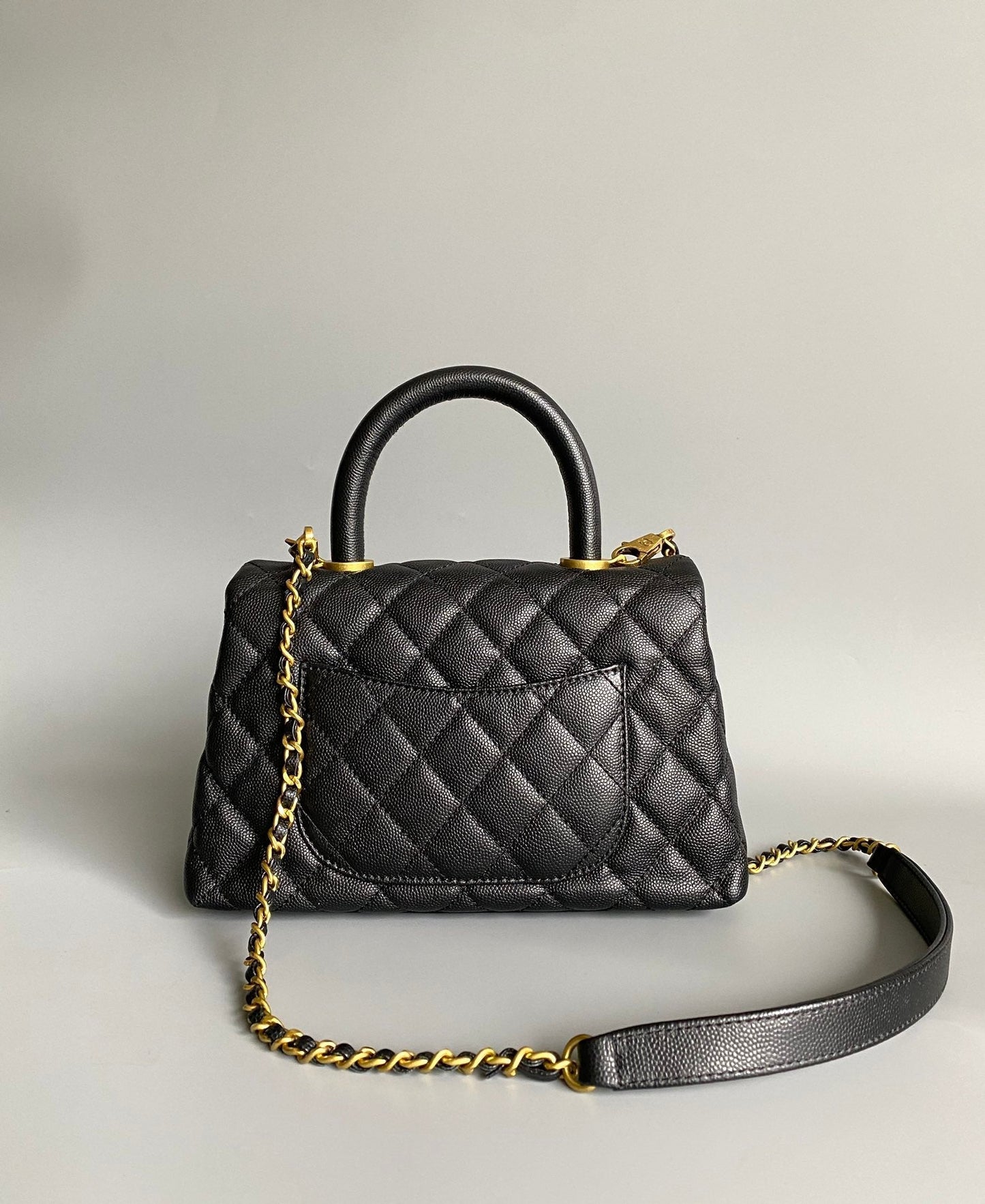 coco handle flap bag 23cm black quilted caviar gold hardware