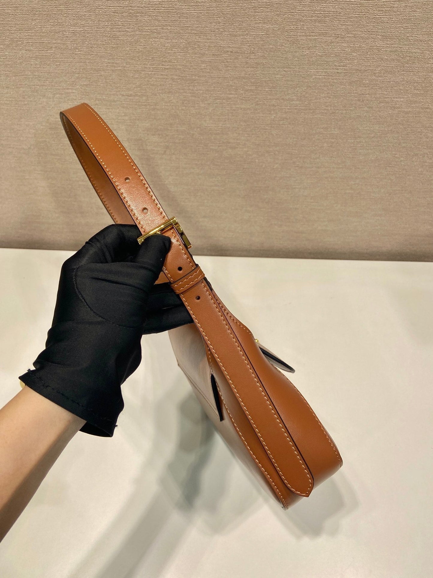 FLAP BAG 25 IN CINNAMON BROWN SMOOTH CALFSKIN TRIANGLE LOGO