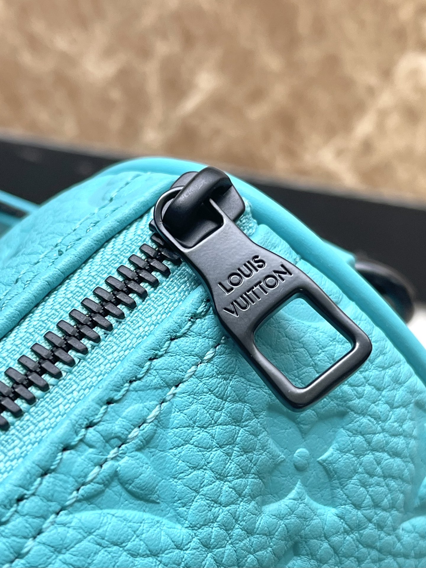 KEEPALL BANDOULI¨¨RE 25 IN TURQUOISE BLUE MONOGRAM EMBOSSED CALFSKIN