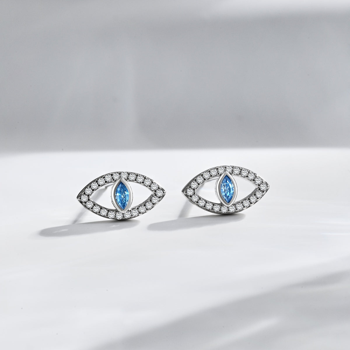 [HOT]Blue Devil Eyes Hollow Stud Earrings