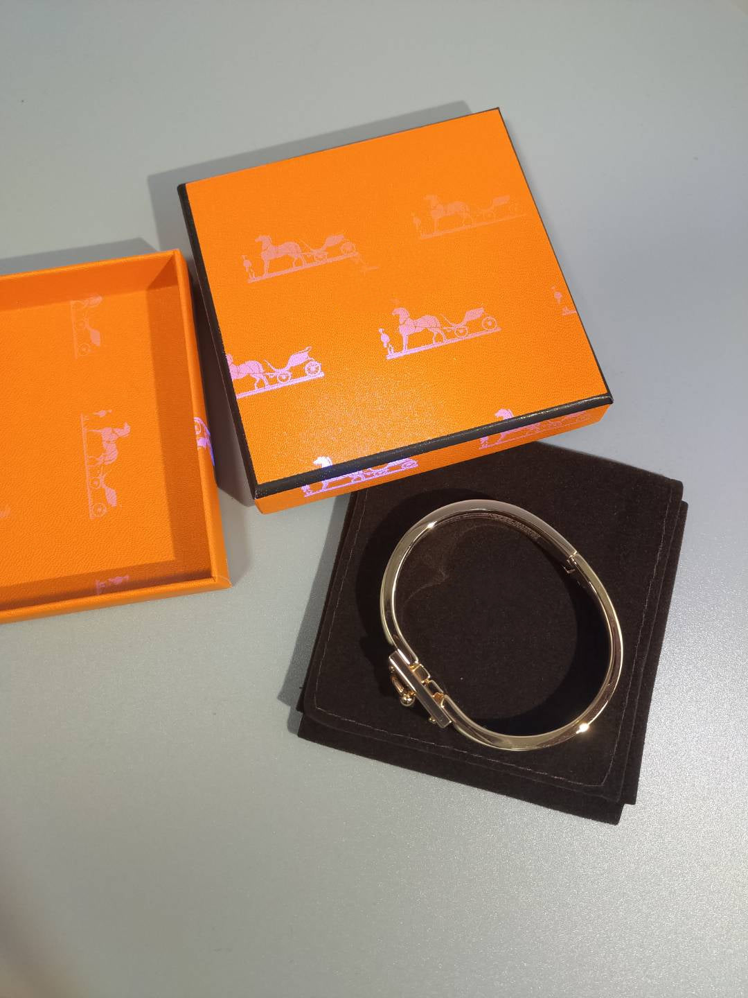 DIANA H ORANGE BRACELET