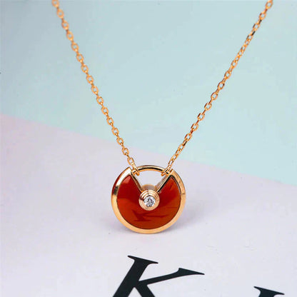 DIANA AMULETTE GOLD CARNELIAN ONYX NECKLACE