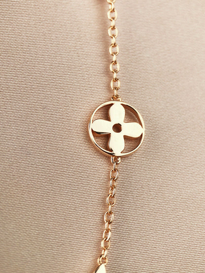 DIANA STAR AND SUN 7 MOTIFS GOLD BRACELET