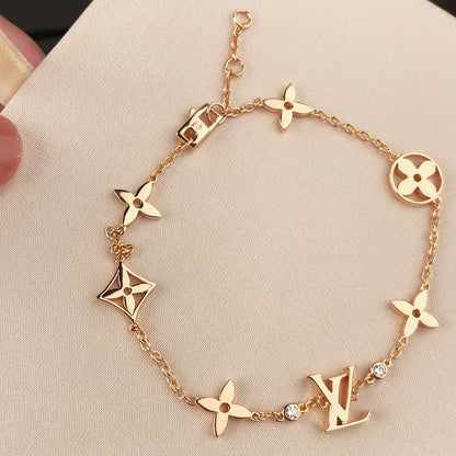DIANA STAR AND SUN 7 MOTIFS GOLD BRACELET