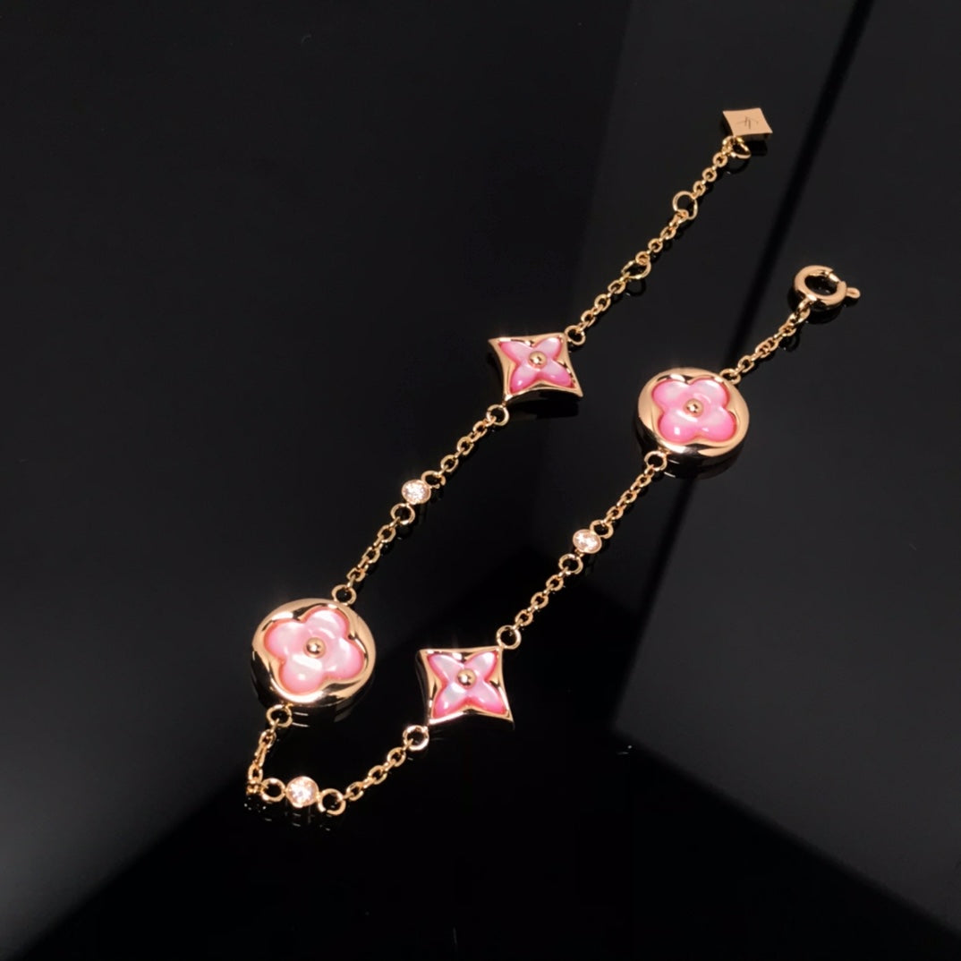 DIANA STAR AND SUN 4 MOTIF PINK MOP PINK GOLD BRACELET