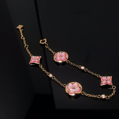 DIANA STAR AND SUN 4 MOTIF PINK MOP PINK GOLD BRACELET