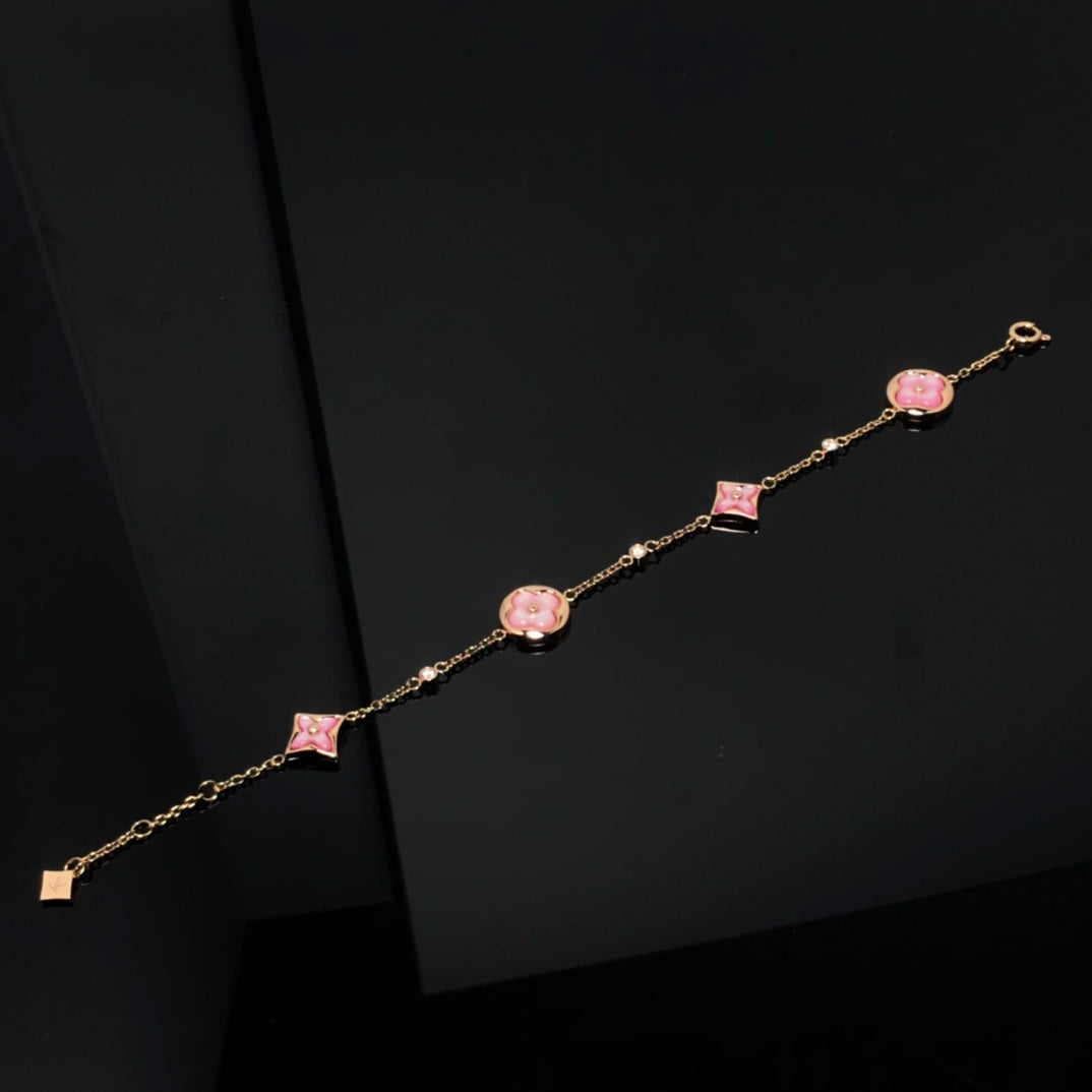DIANA STAR AND SUN 4 MOTIF PINK MOP PINK GOLD BRACELET