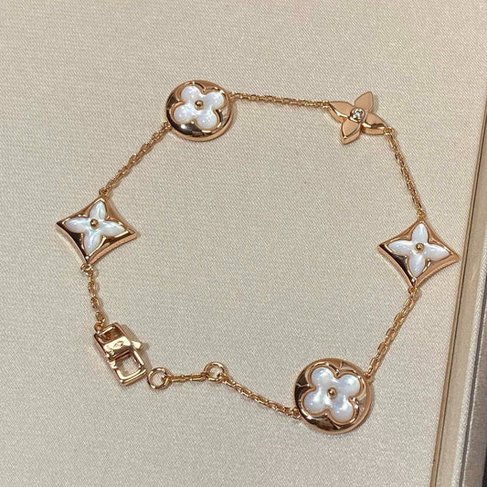 DIANA STAR AND SUN 5 MOTIF MOP PINK GOLD BRACELET