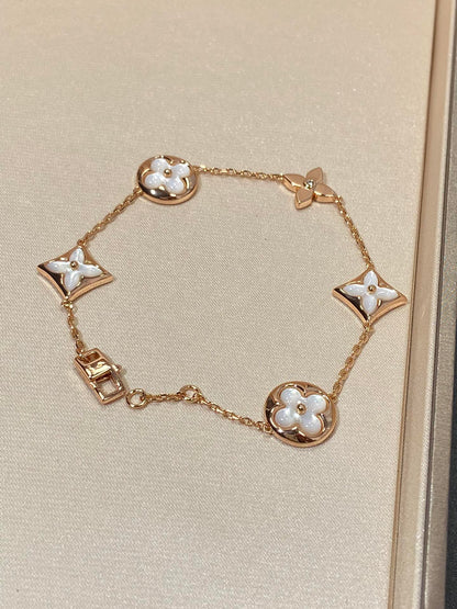 DIANA STAR AND SUN 5 MOTIF MOP PINK GOLD BRACELET