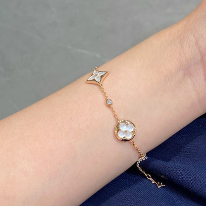 DIANA STAR AND SUN 4 MOTIF WHITE MOP PINK GOLD BRACELET