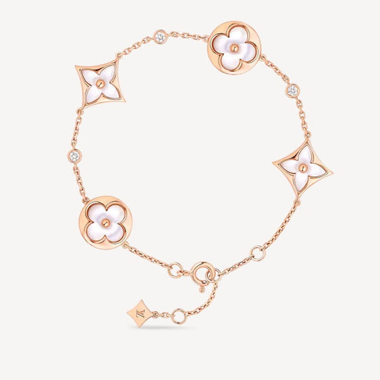 DIANA STAR AND SUN 4 MOTIF WHITE MOP PINK GOLD BRACELET