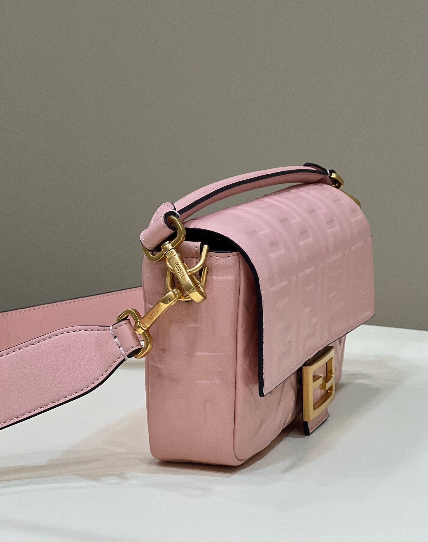 BAGUETTE WITH FF MOTIF 27 IN LIGHT PINK SOFT LAMBSKIN GOLD HARDWARE