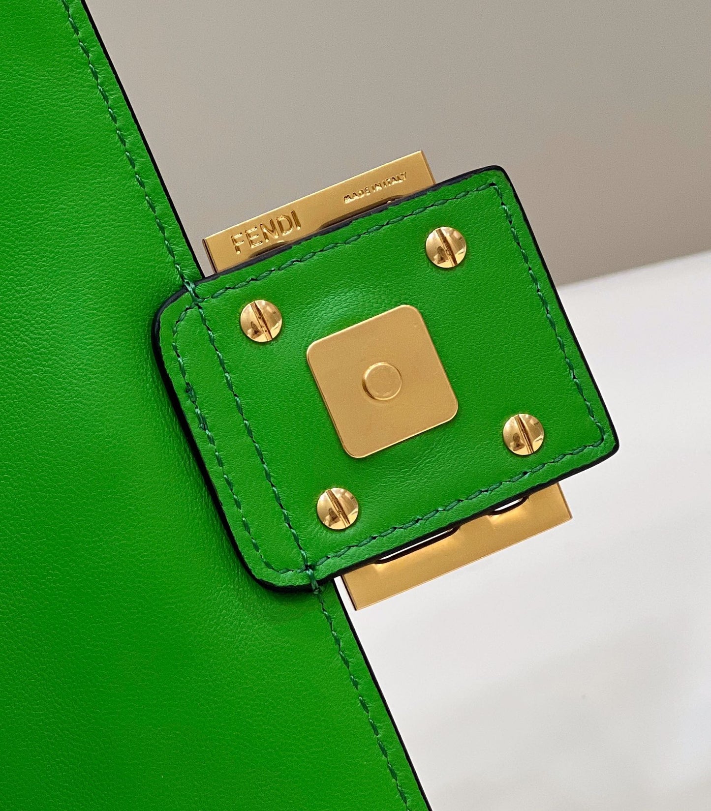 BAGUETTE WITH FF MOTIF 27 IN EMERALD GREEN SOFT LAMBSKIN GOLD HARDWARE