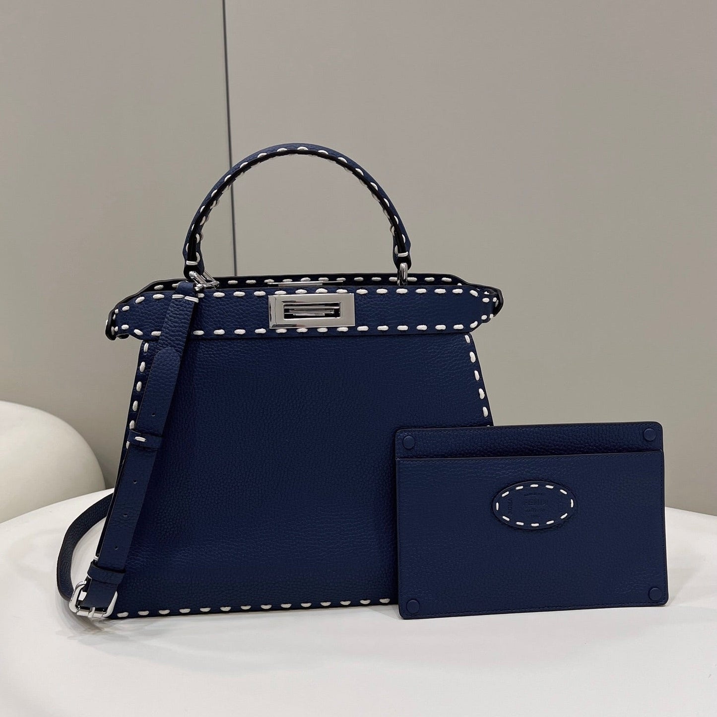 PEEKABOO ISEEU 33 IN NAVY BLUE GRAINED CALFSKIN SILVER HARDWARE