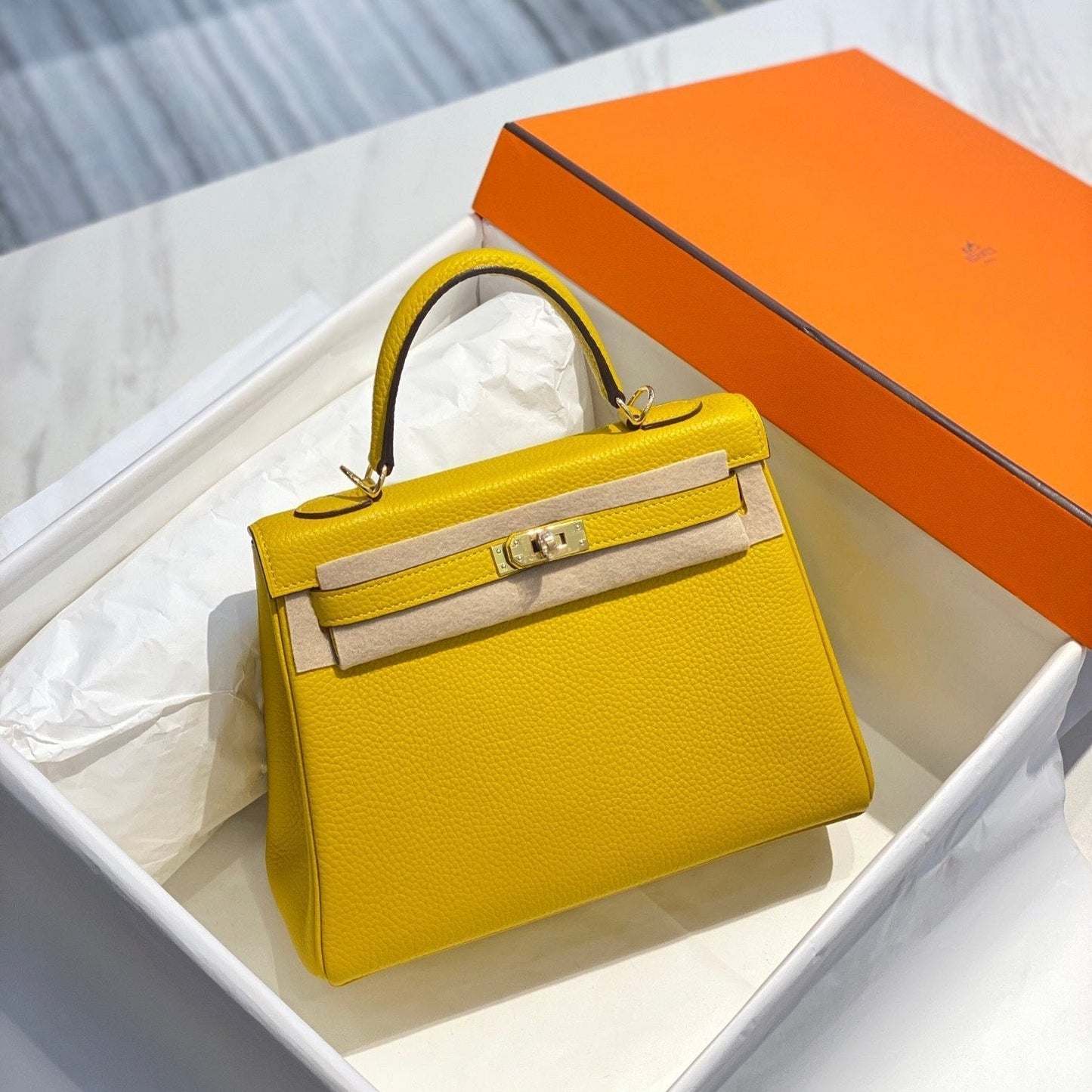 HM KELLY 25CM YELLOW TOGO GOLD HARDWARE