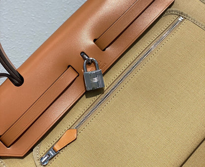 Herbag 31 Toile Beige Canvas Gold Cowhide Leather