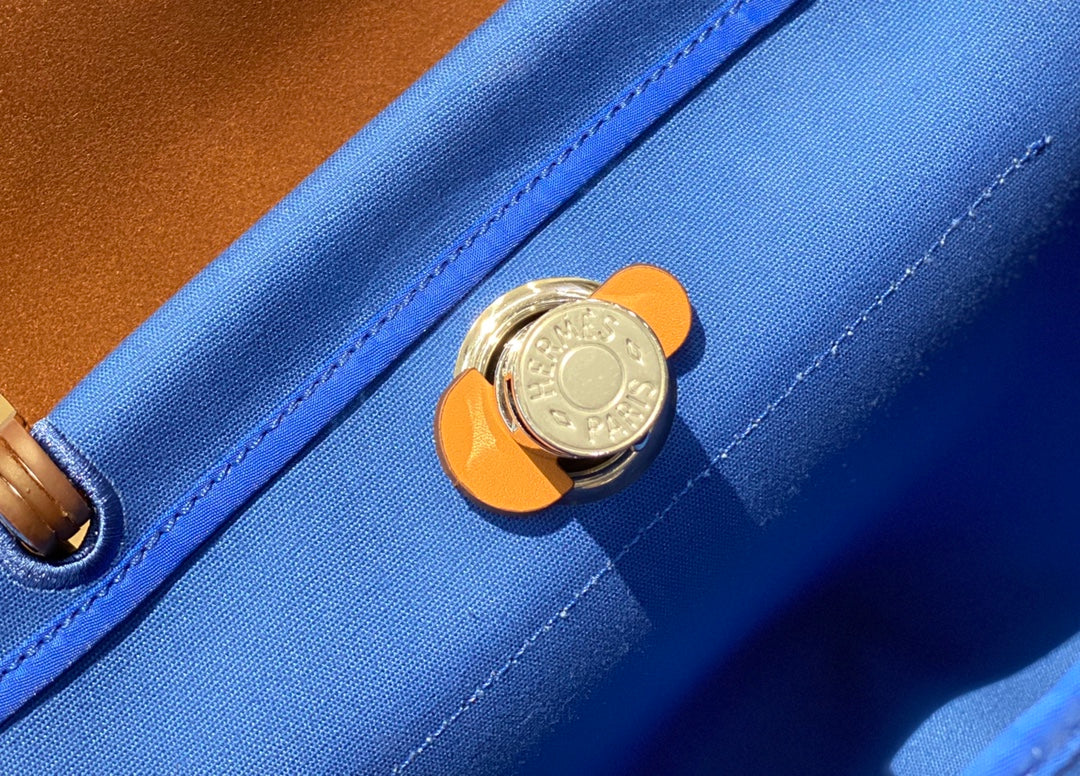 Herbag 31 Toile Blue Canvas Gold Cowhide Leather