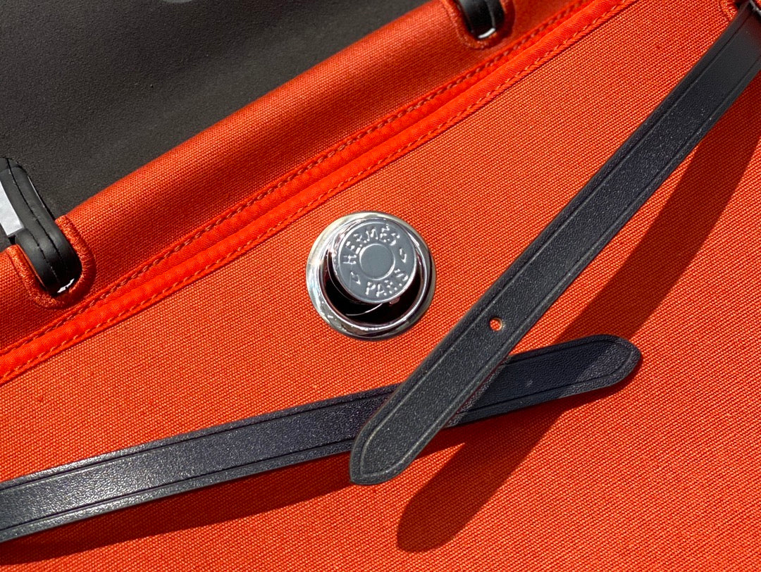 Herbag 31 Toile Red Orange Canvas Black Cowhide Leather