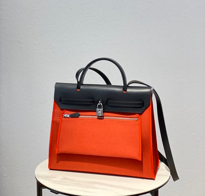 Herbag 31 Toile Red Orange Canvas Black Cowhide Leather