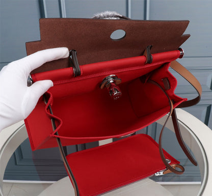 HM HERBAG ZIP 31 RED AND CIDER CANVAS