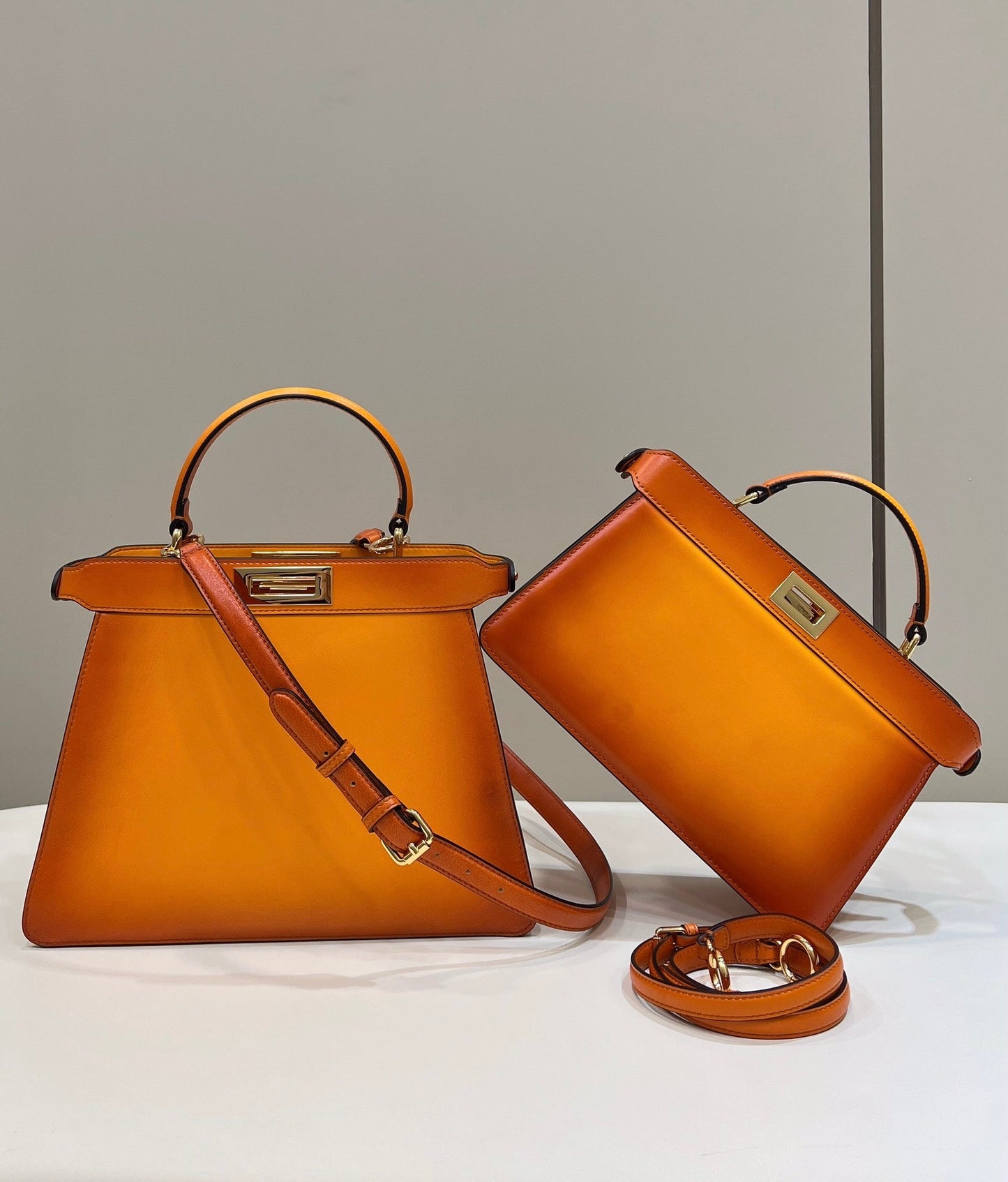 PEEKABOO ISEEU 33 IN ORANGE OMBRE SMOOTH CALFSKIN GOLD HARDWARE