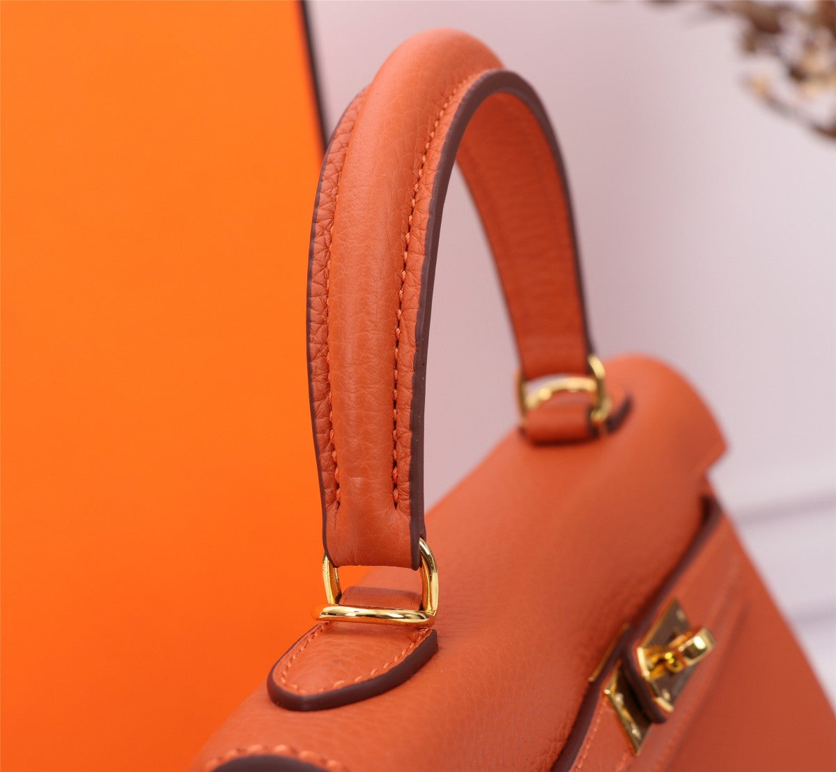 HM KELLY BAG 25 ORANGE TOGO GOLD HARDWARE