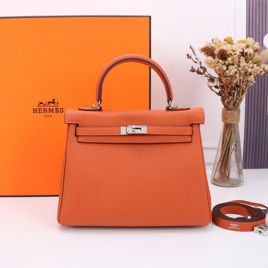 HM KELLY BAG 25 ORANGE TOGO SILVER HARDWARE