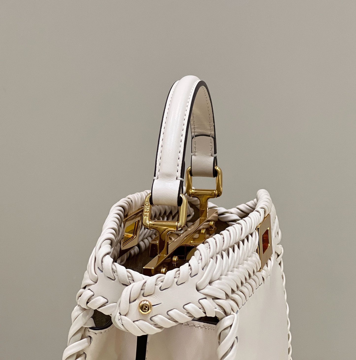 PEEKABOO ISEEU 27 IN WHITE SMOOTH CALFSKIN WITH WOVEN TRIM GOLD HARDWARE