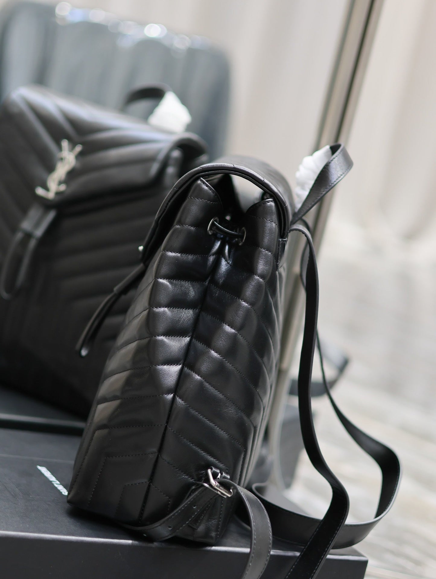 LOU BACKPACK 33 IN BLACK QUILTED CALFSKIN SILVER HARDWARE