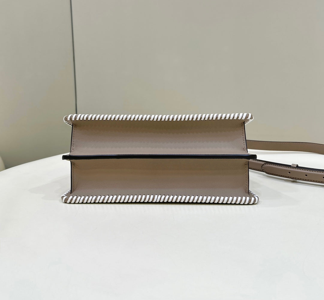 PEEKABOO ISEEU 27 IN MEDIUM BROWN INTERLACED CALFSKIN GOLD HARDWARE