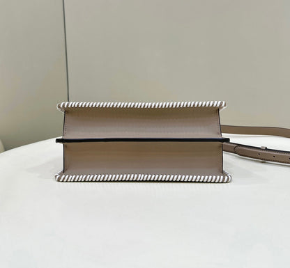 PEEKABOO ISEEU 27 IN MEDIUM BROWN INTERLACED CALFSKIN GOLD HARDWARE