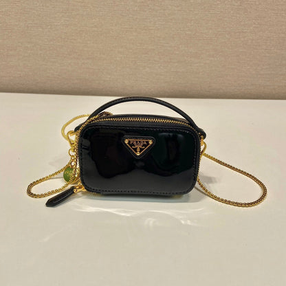 MINI HAND BAG 11 WITH GOLD STRAP IN BLACK PATENT CALFSKIN