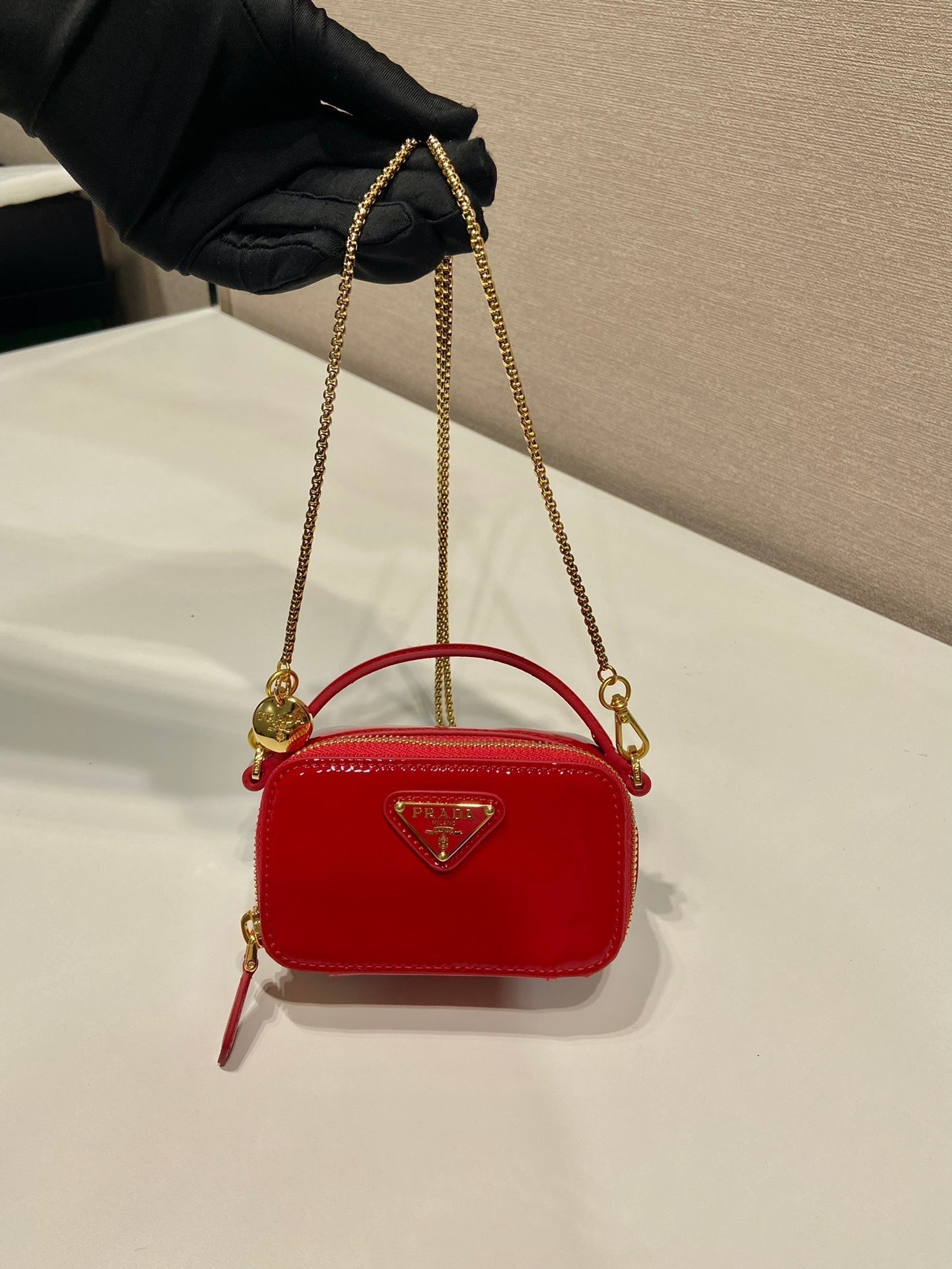 MINI HAND BAG 11 WITH GOLD STRAP IN RED PATENT CALFSKIN