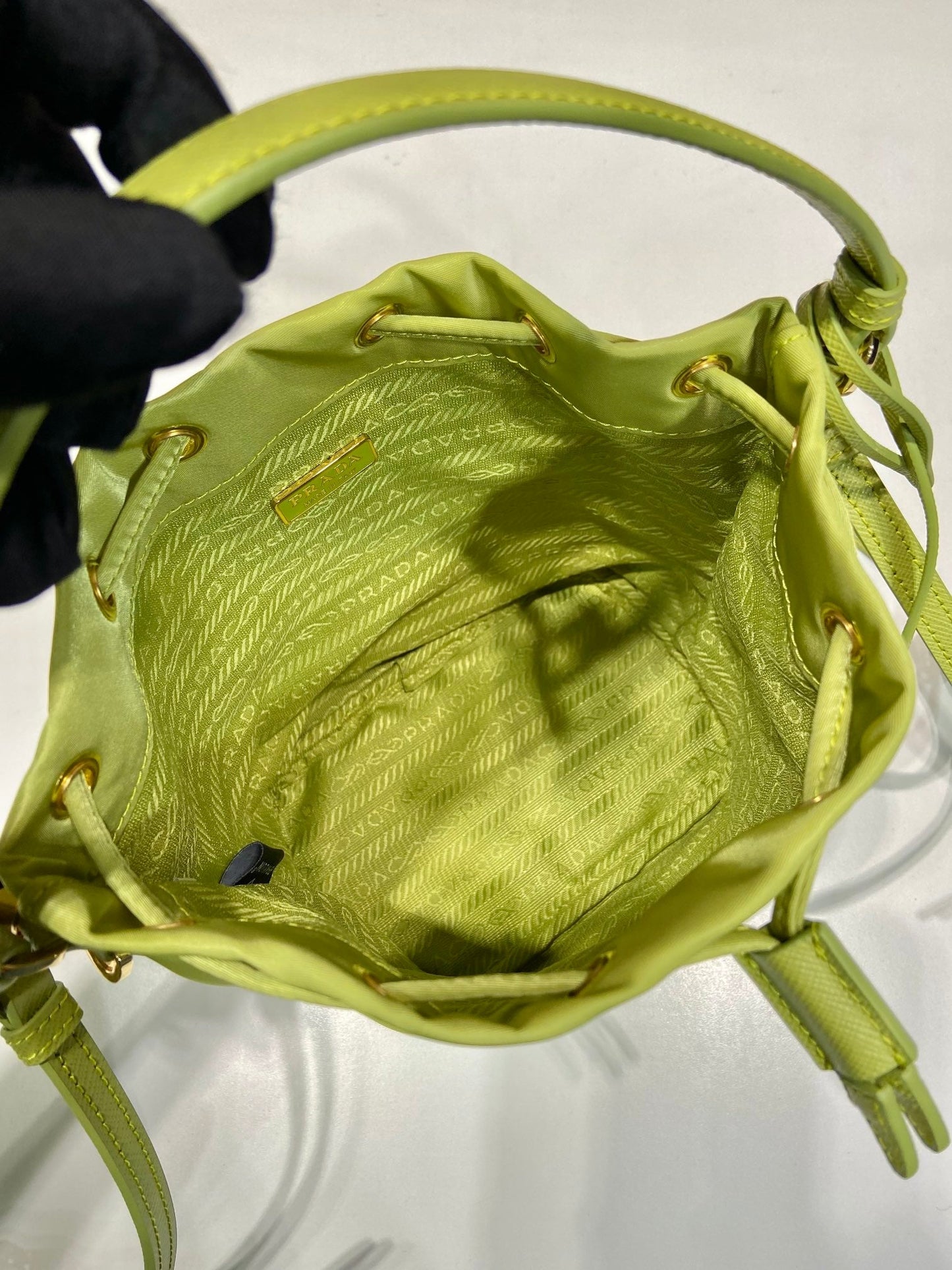 BUCKET BAG 19 IN APPLE GREEN RE-NYLON AND SAFFIANO LEATHER HANDLE