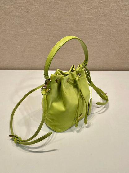 BUCKET BAG 19 IN APPLE GREEN RE-NYLON AND SAFFIANO LEATHER HANDLE