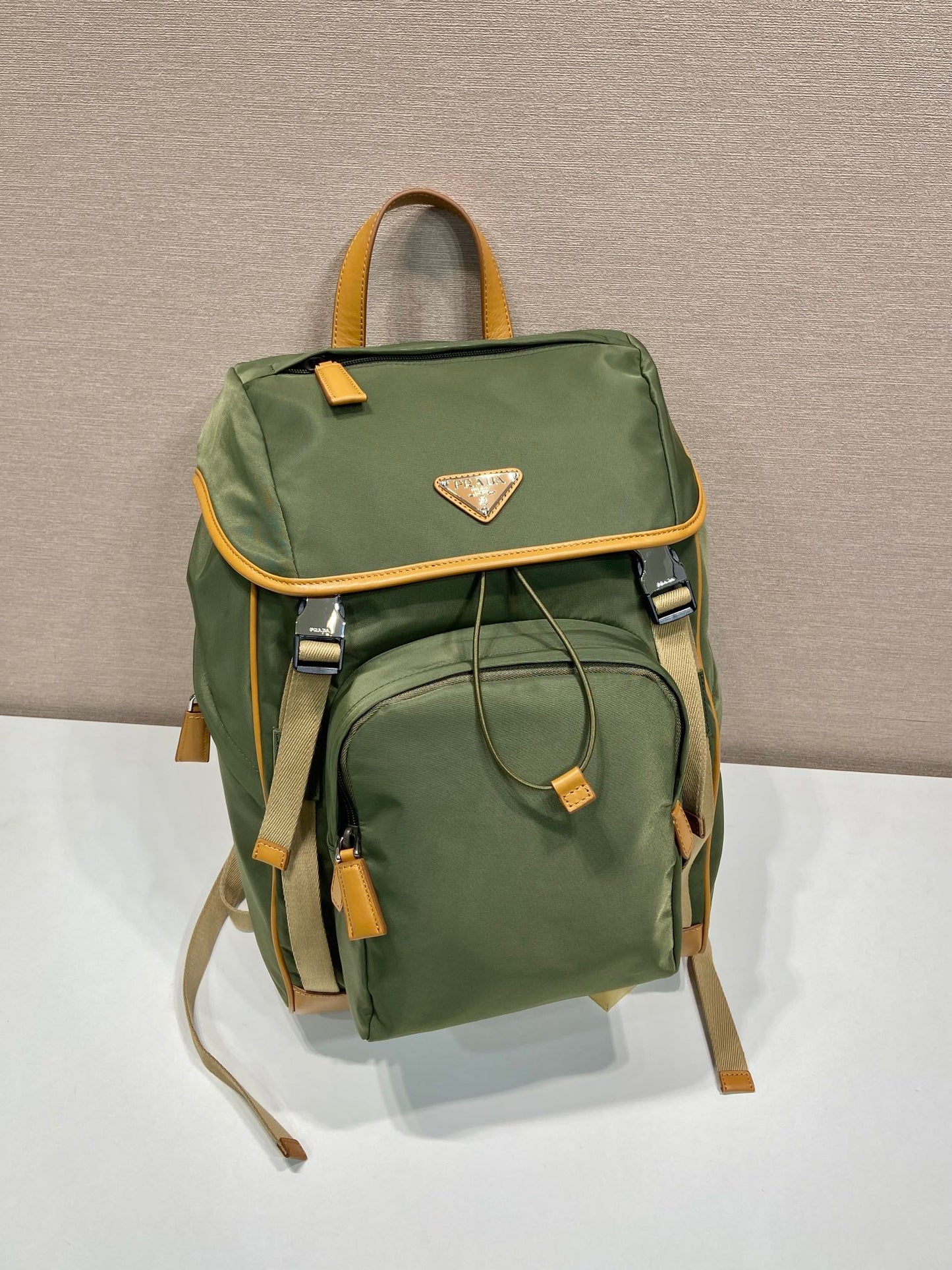 BACKPACK 45 IN SEAWEED GREEN RE-NYLON AND BROWN CALFSKIN TRIM