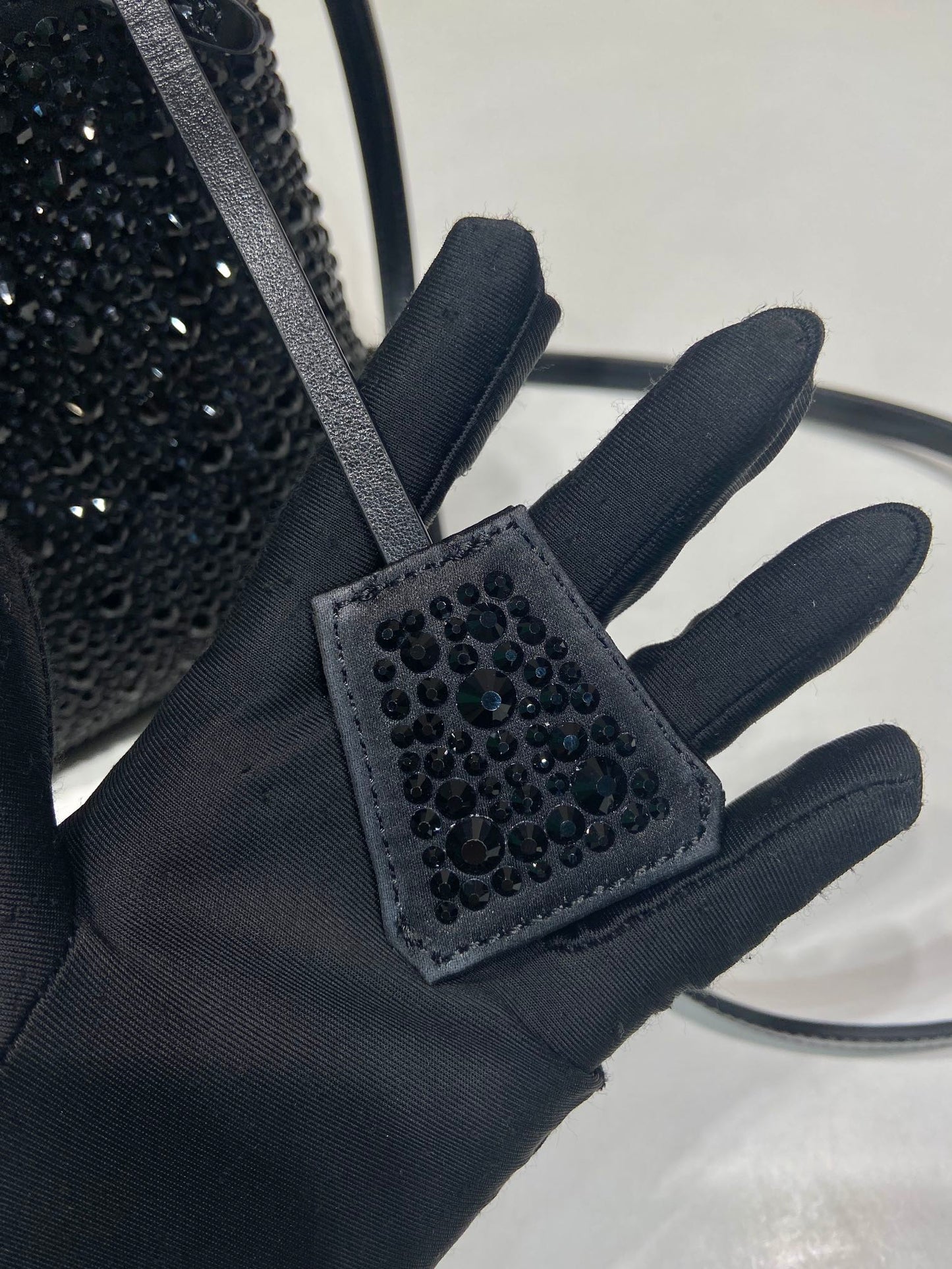 PANIER BUCKET BAG 16 IN BLACK CALFSKIN ATTACHED FULL CRYSTALS