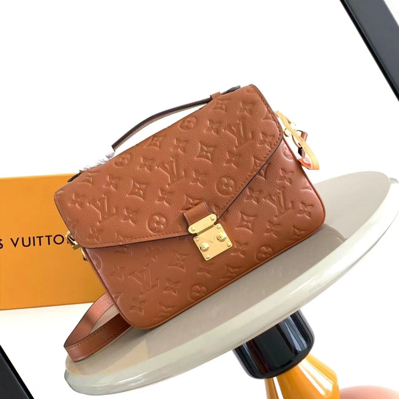 POCHETTE M¨¦TIS 25 IN COGNAC MONOGRAM EMPREINTE LEATHER GOLD HARDWARE