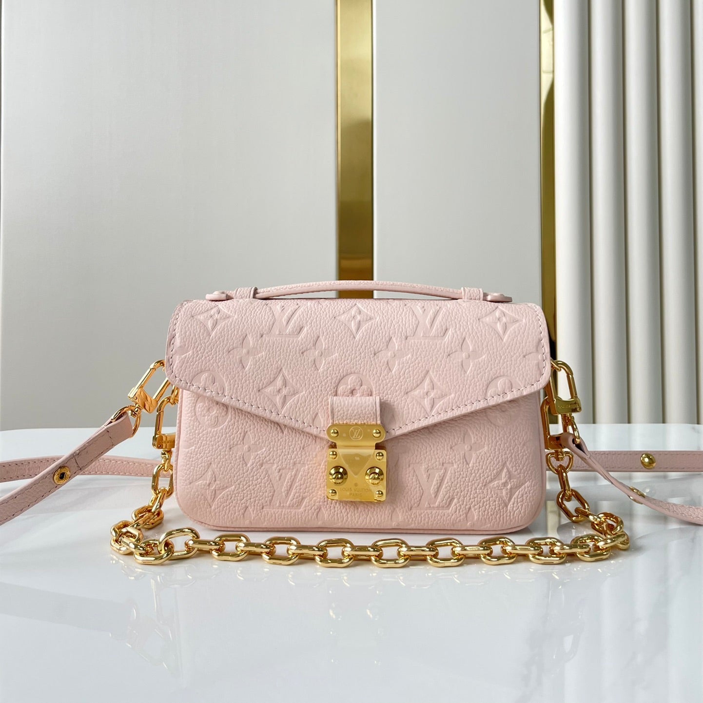POCHETTE M¨¦TIS EAST WEST 21 IN PINK OPALE MONOGRAM ECLIPSE CANVAS GOLD BUCKLE