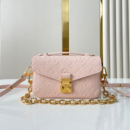 POCHETTE M¨¦TIS EAST WEST 21 IN PINK OPALE MONOGRAM ECLIPSE CANVAS GOLD BUCKLE