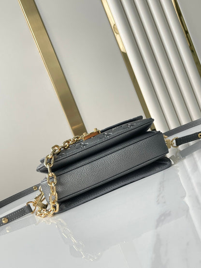 POCHETTE M¨¦TIS EAST WEST 21 IN GUN METAL EMBOSSED CALFSKIN GOLD HARDWARE