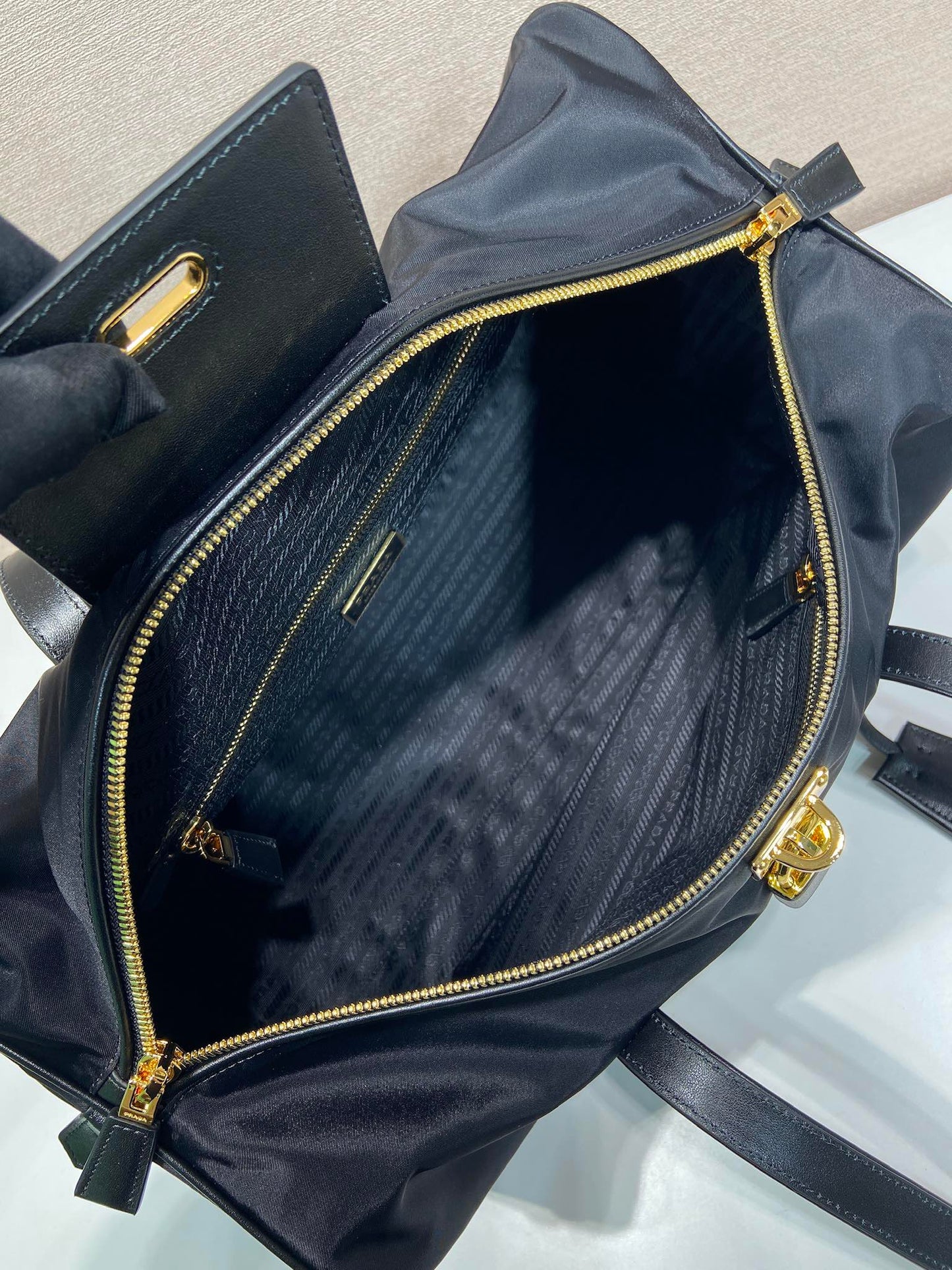 TRAVEL BAG 40 IN BLACK WATERPROOF FABRIC GOLD PADLOCK