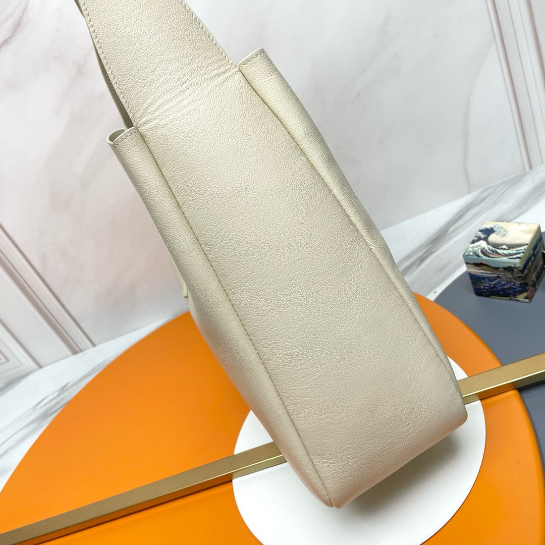 Le 5 a 7 Supple Large hobo bag in ivory leather ghw