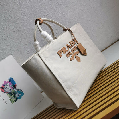Prada Whitte Canvas shopping bag leather trim