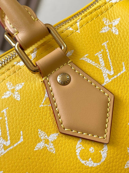 speedy p9 bandouliere 25cm yellow calfskin