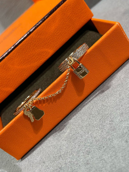 DIANA HM KELLY CLOCHETTE DOUBLE RING IN ROSE GOLD WITH DIAMONDS