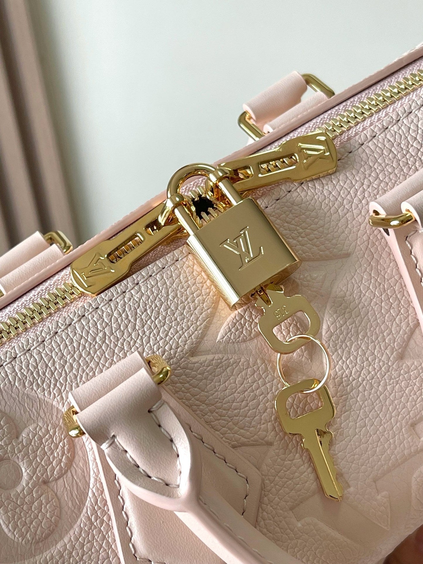 SPEEDY BANDOULI¨¨RE 20 IN LIGHT PINK MONOGRAM EMPREINTE LEATHER