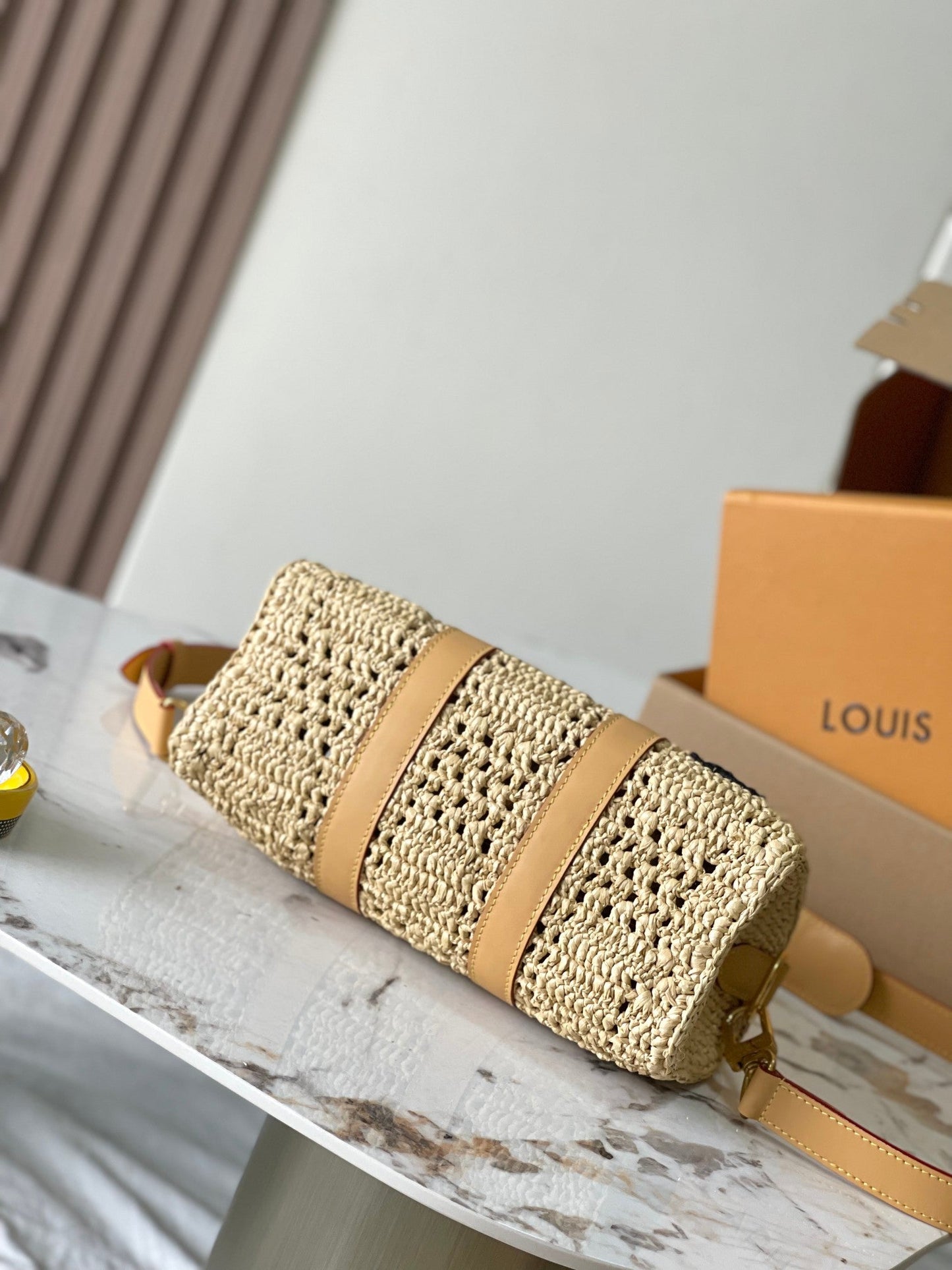 KEEPALL BANDOULI¨¨RE 25 IN BEIGE CROCHETED RAFFIA AND CALFSKIN TRIM