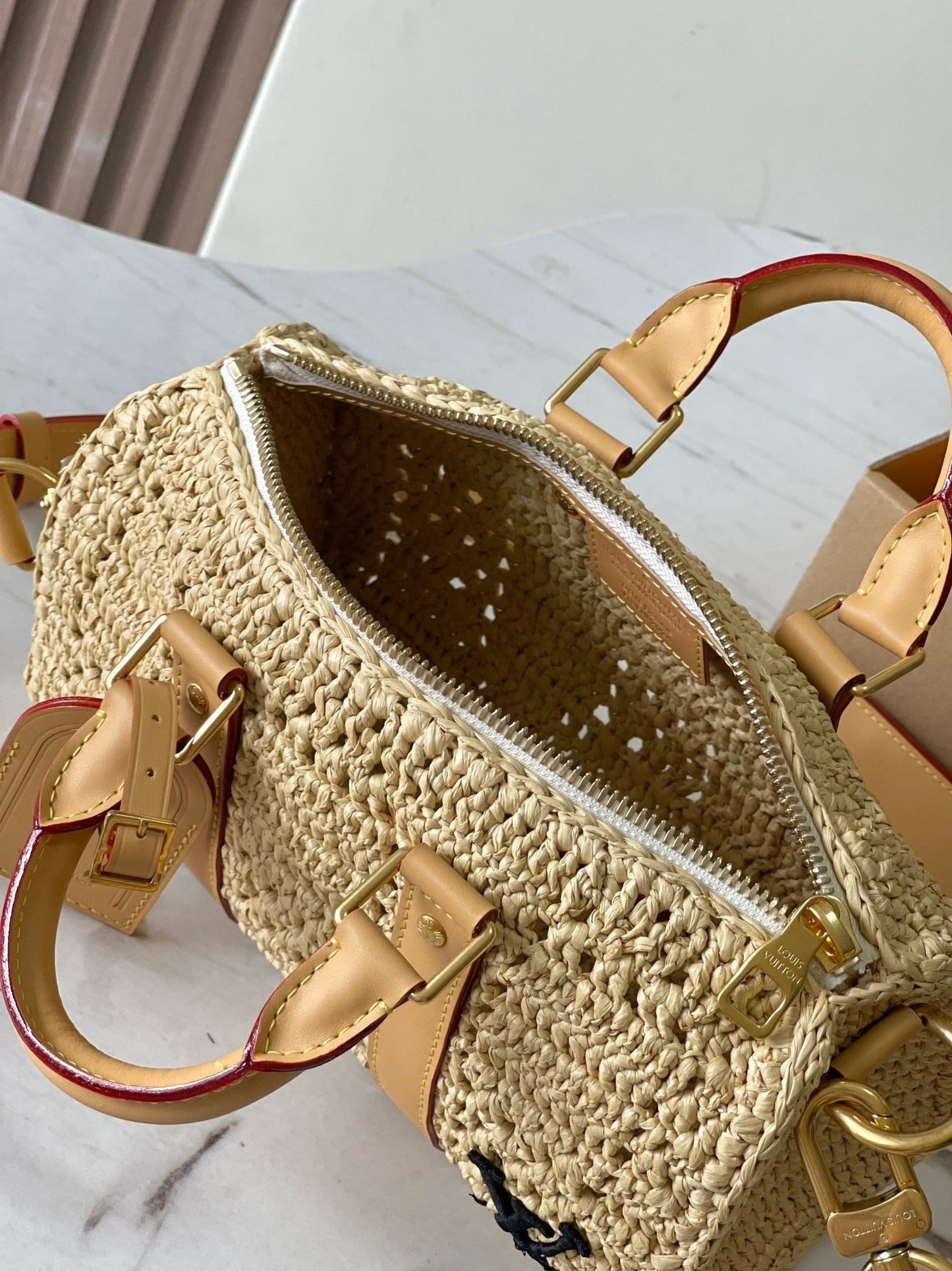 KEEPALL BANDOULI¨¨RE 25 IN BEIGE CROCHETED RAFFIA AND CALFSKIN TRIM