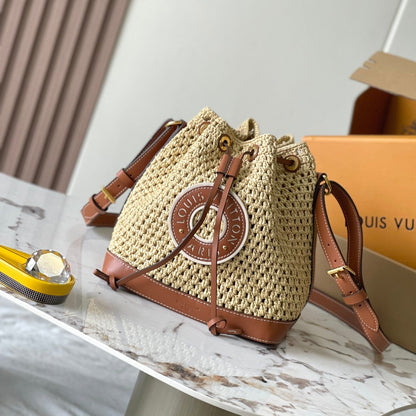 NO¨¦ PURSE 24 IN BEIGE CROCHETED RAFFIA AND BROWN CALFSKIN TRIM